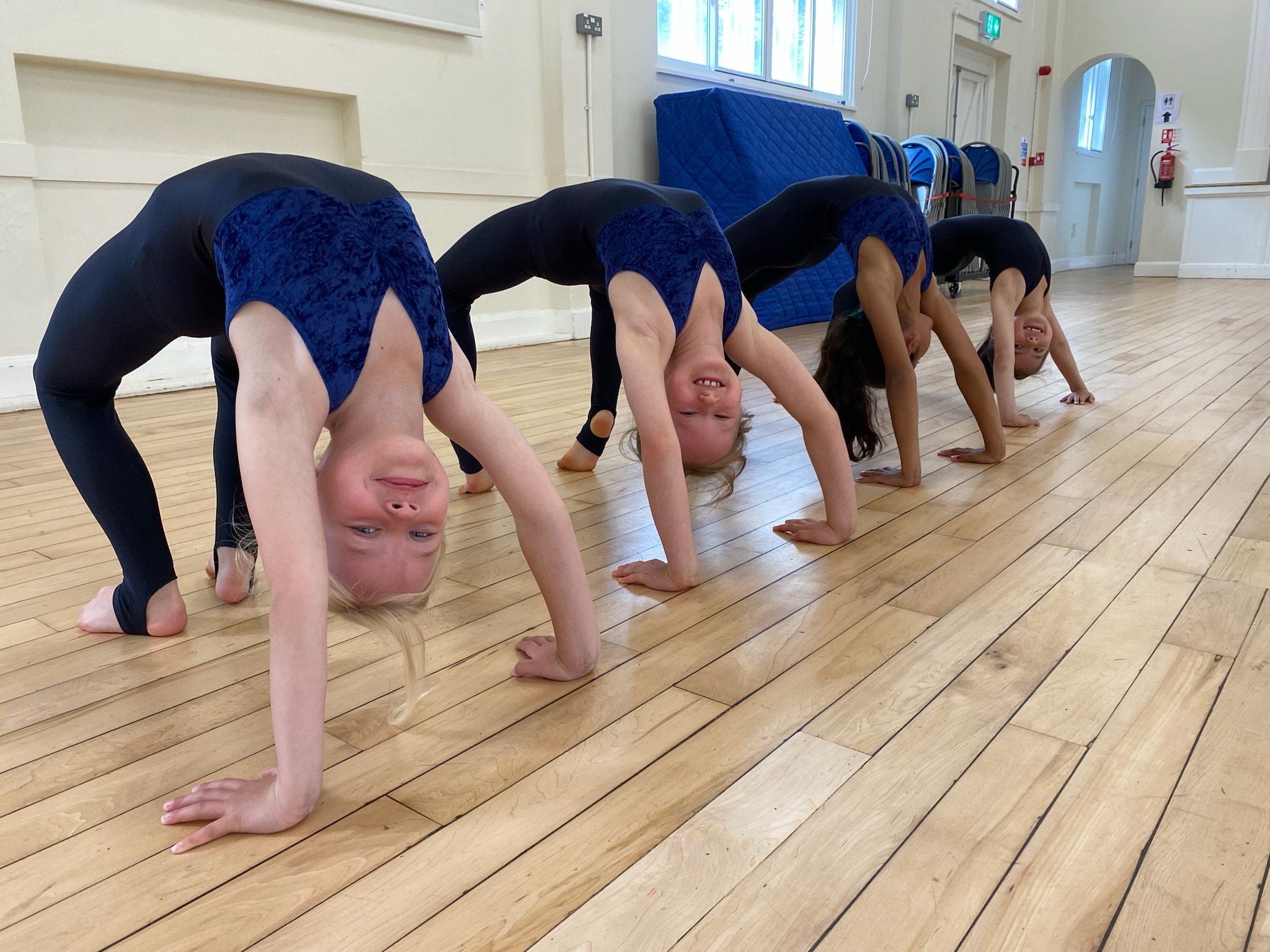 Acro students practising back bends at St Marks Hall